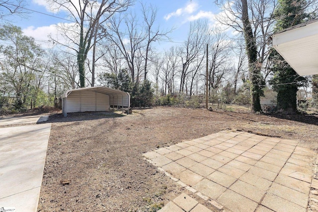 3209 Howland Dr, Anderson, SC 29626 - view of yard featuring driveway and a carport