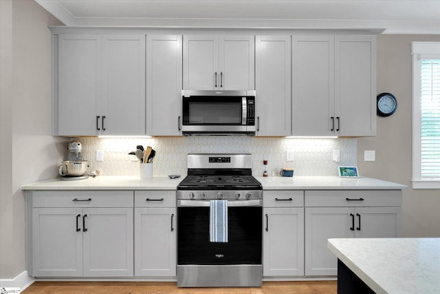 216 Deerview Trl, Simpsonville, SC 29680 - kitchen featuring appliances with stainless steel finishes, light countertops, and backsplash
