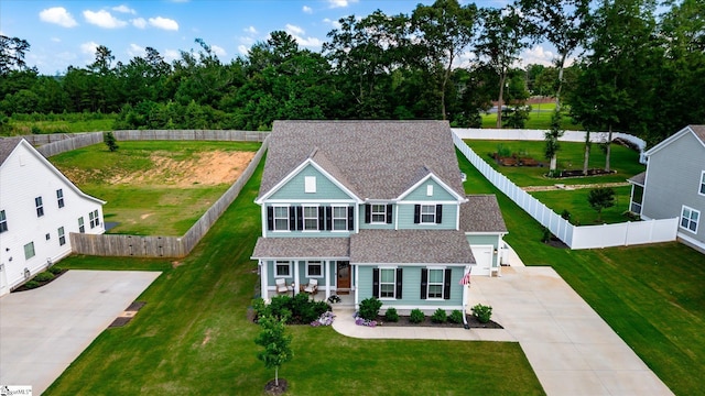 216 Deerview Trl, Simpsonville, SC 29680 - view of front facade with concrete driveway, roof with shingles, and a fenced backyard