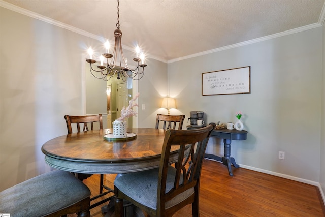 213 Quail Creek Dr, Pickens, SC 29657 - dining room with a chandelier, ornamental molding, and wood finished floors