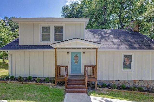 301 Thornwood Dr, Taylors, SC 29687 - view of front of house featuring a shingled roof and a chimney