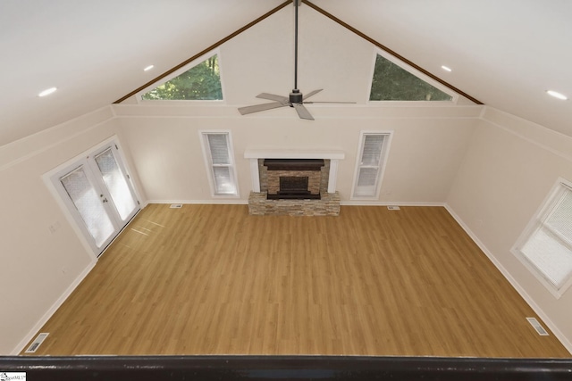 301 Thornwood Dr, Taylors, SC 29687 - unfurnished living room with ceiling fan, high vaulted ceiling, wood finished floors, and healthy amount of natural light