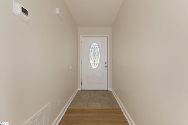 301 Thornwood Dr, Taylors, SC 29687 - doorway featuring baseboards and wood finished floors