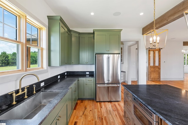 621 Bascule Ridge Ln, Campobello, SC 29322 - kitchen with green cabinets, high end refrigerator, healthy amount of natural light, light wood-style flooring, and recessed lighting
