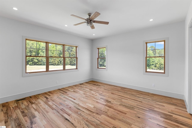 621 Bascule Ridge Ln, Campobello, SC 29322 - spare room featuring plenty of natural light, light wood-type flooring, ceiling fan, and recessed lighting
