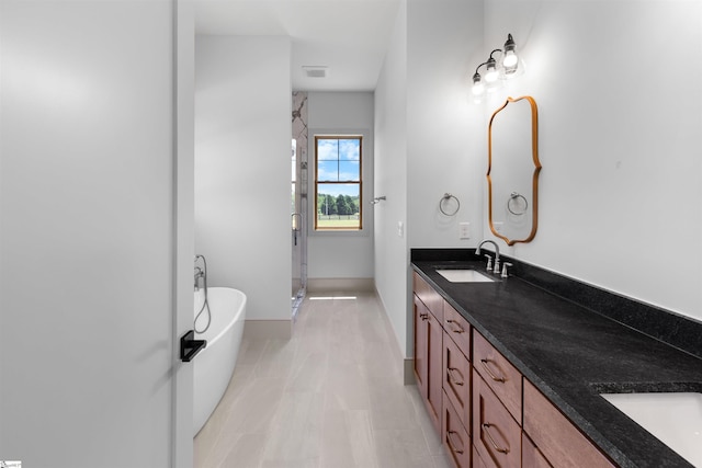621 Bascule Ridge Ln, Campobello, SC 29322 - bathroom with double vanity, a shower stall, and a freestanding bath