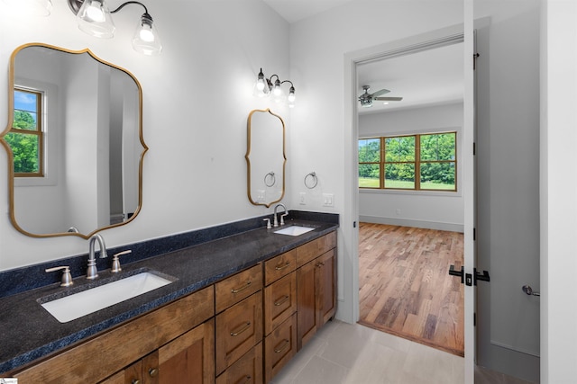 621 Bascule Ridge Ln, Campobello, SC 29322 - full bath featuring double vanity, tile patterned flooring, and a ceiling fan
