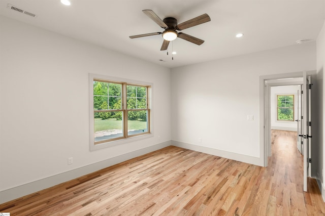 621 Bascule Ridge Ln, Campobello, SC 29322 - empty room featuring light wood-style flooring, recessed lighting, a ceiling fan, and a smoke detector