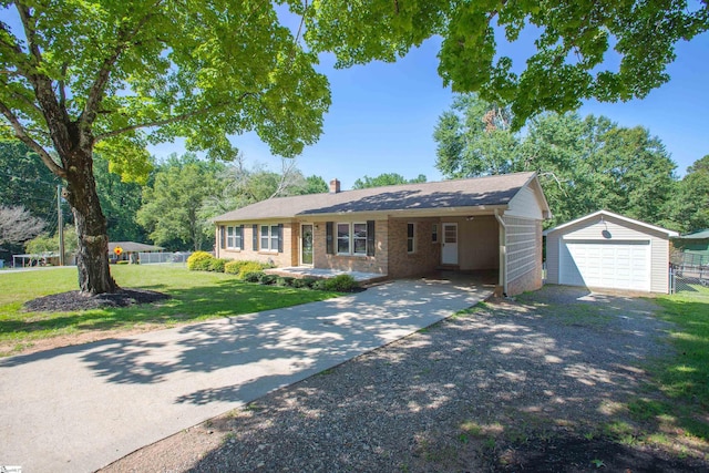214 Cedar Cir, Easley, SC 29642 - ranch-style home featuring driveway, an outdoor structure, a chimney, a detached garage, and brick siding