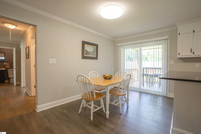 214 Cedar Cir, Easley, SC 29642 - dining space with crown molding, dark wood-style floors, and attic access