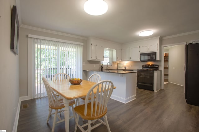 214 Cedar Cir, Easley, SC 29642 - dining space featuring dark wood finished floors and crown molding