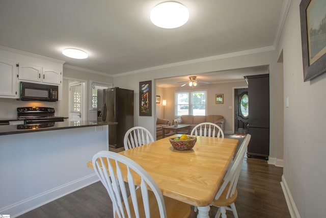 214 Cedar Cir, Easley, SC 29642 - dining space with dark wood finished floors, ornamental molding, and a ceiling fan