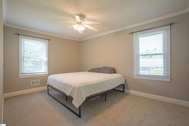 214 Cedar Cir, Easley, SC 29642 - bedroom with crown molding, light carpet, and ceiling fan