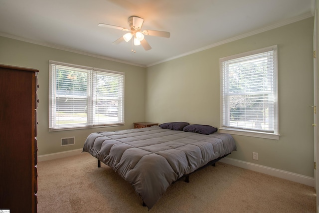 214 Cedar Cir, Easley, SC 29642 - bedroom featuring multiple windows, crown molding, carpet floors, and ceiling fan