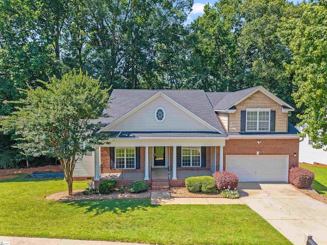508 Fieldgate Ct, Mauldin, SC 29662 - view of front of home featuring a porch, an attached garage, driveway, a front yard, and brick siding