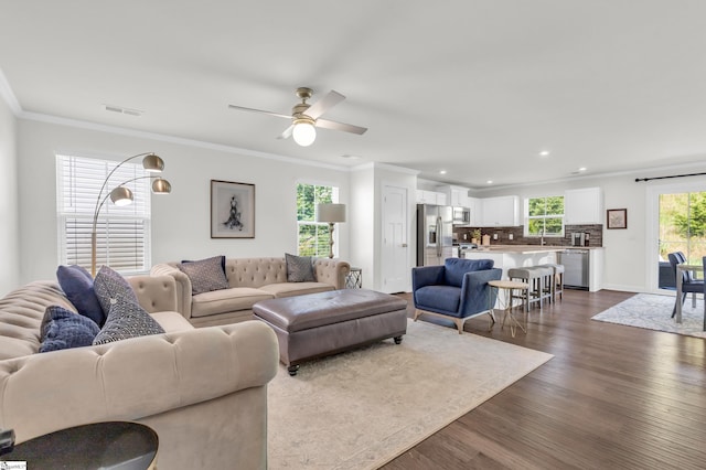 639 Lynndale Ct, Greenville, SC 29617 - living area with dark wood-style floors, ornamental molding, recessed lighting, and a ceiling fan