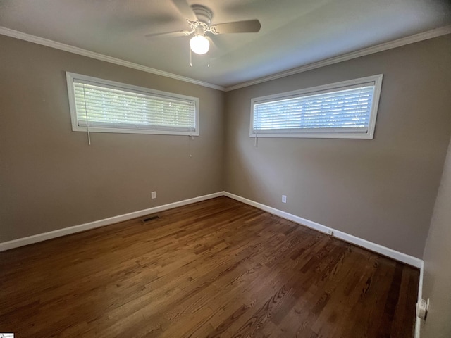18 Maywood Dr, Taylors, SC 29687 - spare room featuring a ceiling fan, ornamental molding, and dark wood-style flooring