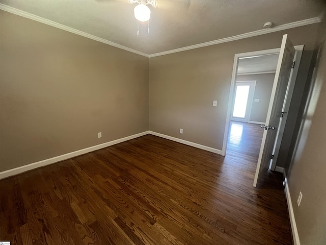 18 Maywood Dr, Taylors, SC 29687 - spare room featuring dark wood finished floors, ceiling fan, ornamental molding, and a smoke detector