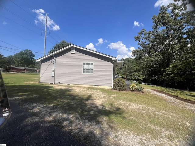 18 Maywood Dr, Taylors, SC 29687 - view of home's exterior featuring crawl space and a yard
