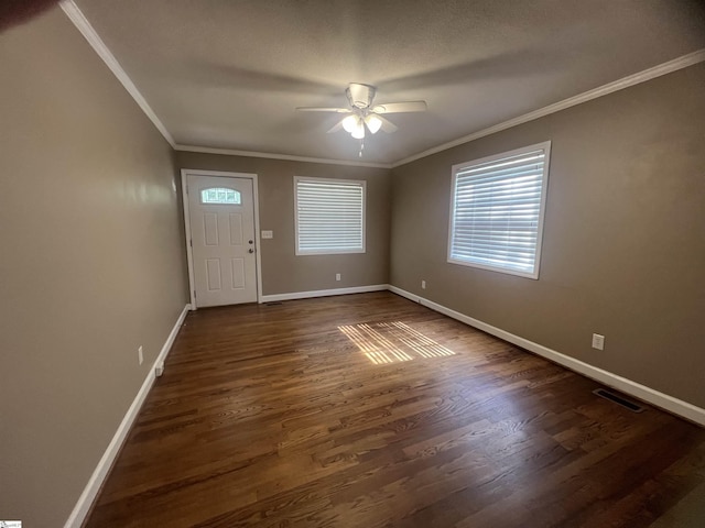 18 Maywood Dr, Taylors, SC 29687 - foyer with crown molding, a ceiling fan, and dark wood-style floors