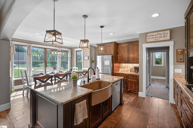 515 Herman Brooks Rd, Belton, SC 29627 - kitchen with stainless steel appliances, dark wood-type flooring, tasteful backsplash, recessed lighting, and decorative light fixtures