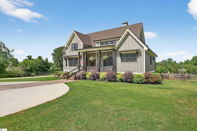 515 Herman Brooks Rd, Belton, SC 29627 - craftsman-style home with board and batten siding, a chimney, covered porch, and roof with shingles