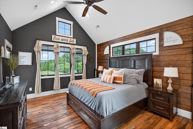 515 Herman Brooks Rd, Belton, SC 29627 - bedroom with high vaulted ceiling, dark wood-type flooring, wood walls, a ceiling fan, and recessed lighting