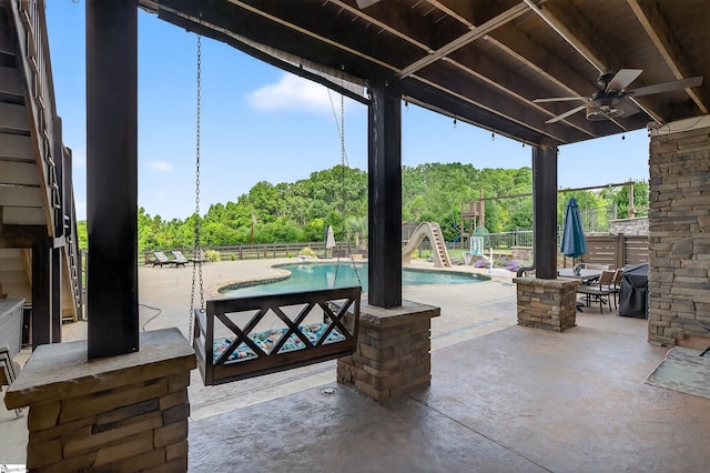 515 Herman Brooks Rd, Belton, SC 29627 - view of patio / terrace with ceiling fan and a forest view