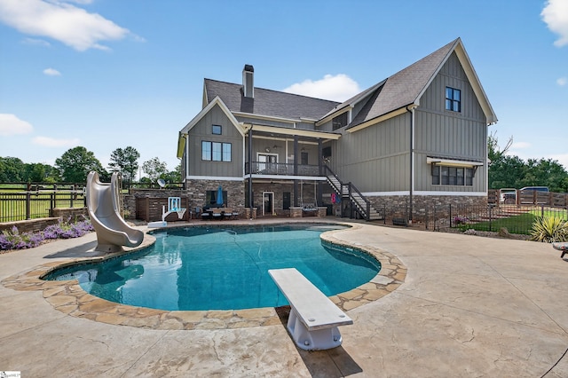 515 Herman Brooks Rd, Belton, SC 29627 - view of pool with stairway, a water slide, a patio, and a diving board