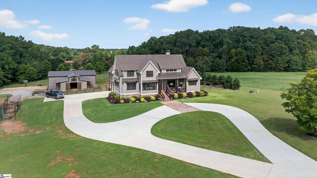515 Herman Brooks Rd, Belton, SC 29627 - view of front of property featuring a porch, a standing seam roof, a front yard, and a metal roof