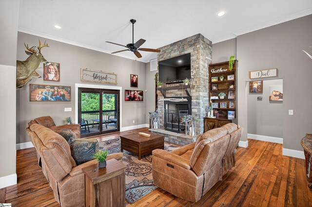 515 Herman Brooks Rd, Belton, SC 29627 - living room with a ceiling fan, ornamental molding, wood-type flooring, a stone fireplace, and recessed lighting