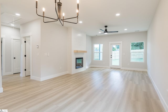 166 Dunbar St, Wellford, SC 29385 - unfurnished living room featuring attic access, ceiling fan, light wood-style floors, a fireplace, and recessed lighting