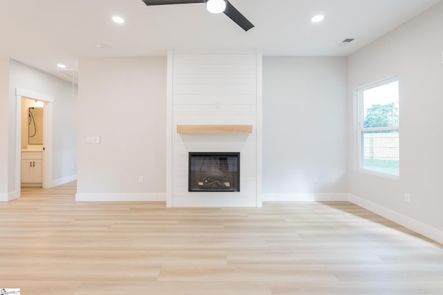 166 Dunbar St, Wellford, SC 29385 - unfurnished living room with a ceiling fan, light wood-type flooring, recessed lighting, a fireplace, and attic access