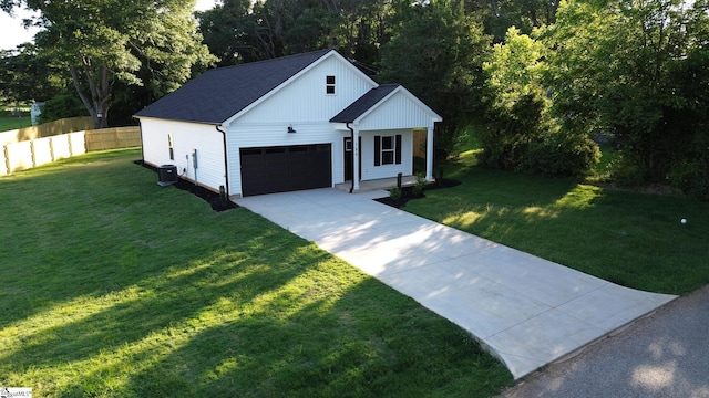166 Dunbar St, Wellford, SC 29385 - modern farmhouse featuring driveway and an attached garage