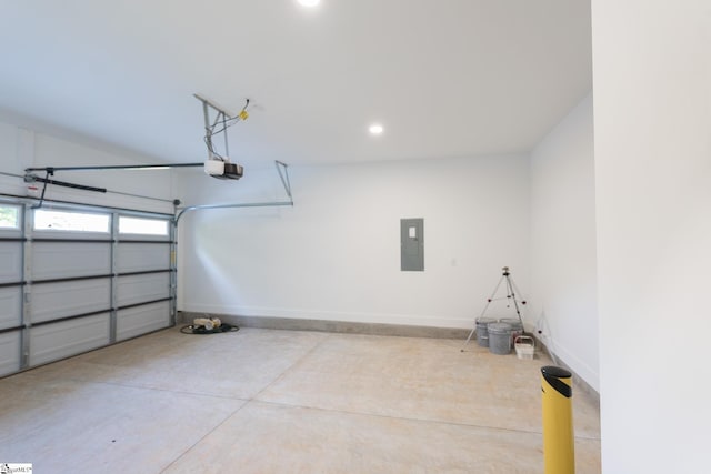 166 Dunbar St, Wellford, SC 29385 - garage featuring electric panel, a garage door opener, and recessed lighting