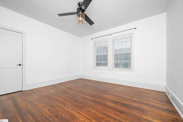 521 Anderson St, Greenville, SC 29601 - spare room featuring a ceiling fan and dark wood-type flooring