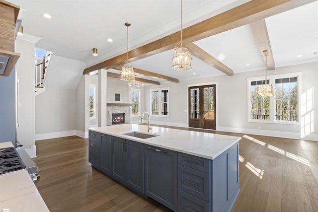 404 Odell St, Greenville, SC 29615 - kitchen featuring open floor plan, a chandelier, dark wood-style flooring, a fireplace, and recessed lighting