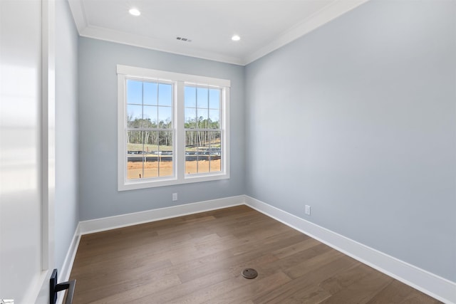 404 Odell St, Greenville, SC 29615 - spare room with ornamental molding, dark wood-style flooring, and recessed lighting
