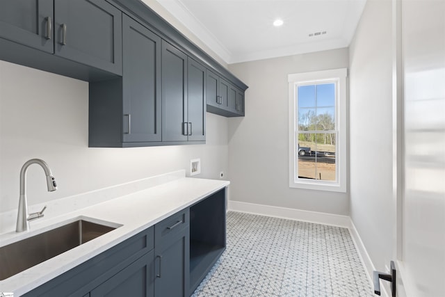 404 Odell St, Greenville, SC 29615 - laundry area featuring cabinet space, light flooring, ornamental molding, hookup for an electric dryer, and washer hookup
