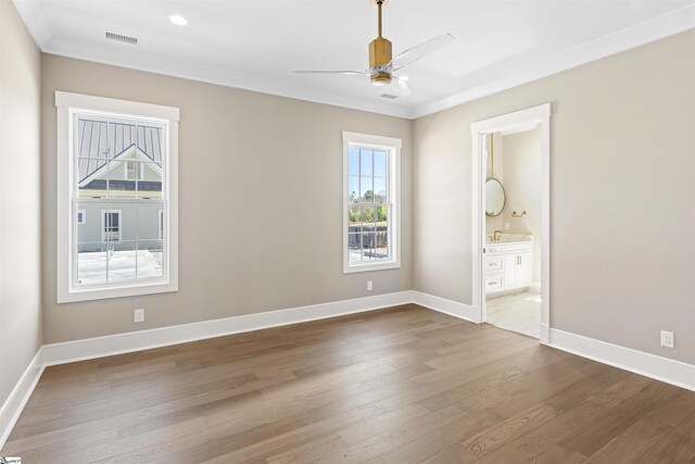 404 Odell St, Greenville, SC 29615 - spare room featuring ceiling fan, dark wood-style flooring, crown molding, and recessed lighting