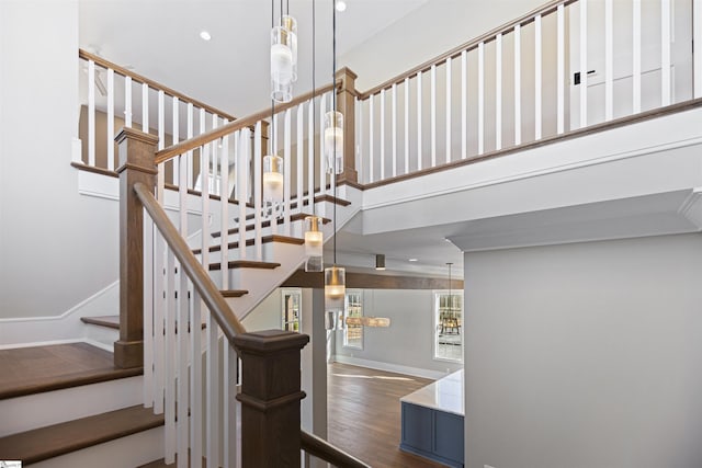 404 Odell St, Greenville, SC 29615 - staircase featuring wood finished floors, a chandelier, a towering ceiling, and recessed lighting