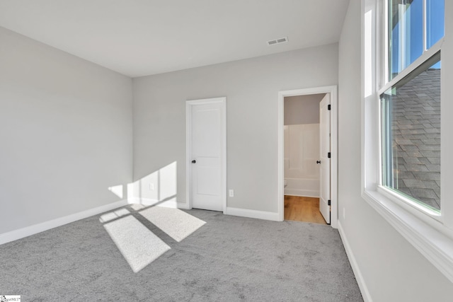 140 Mimosa Rd Lot 27, Inman, SC 29349 - unfurnished bedroom featuring carpet flooring and ensuite bath