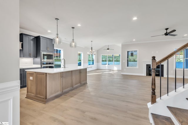 140 Mimosa Rd Lot 27, Inman, SC 29349 - kitchen with stainless steel appliances, crown molding, light wood finished floors, recessed lighting, and a ceiling fan