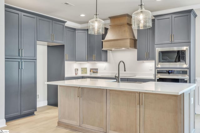 140 Mimosa Rd Lot 27, Inman, SC 29349 - kitchen featuring appliances with stainless steel finishes, custom exhaust hood, light wood-style floors, a kitchen island with sink, and recessed lighting