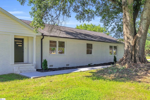 2 Melbourne Ln, Greenville, SC 29615 - view of property exterior with crawl space, a shingled roof, a lawn, brick siding, and entry steps
