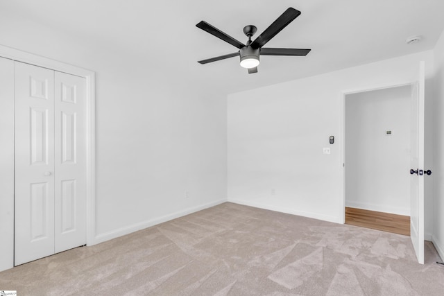 2 Melbourne Ln, Greenville, SC 29615 - unfurnished bedroom with carpet, a closet, and a ceiling fan