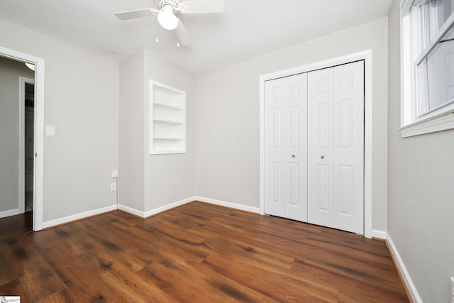 101 Havendale Dr, Fountain Inn, SC 29644 - unfurnished bedroom featuring dark wood-type flooring, a ceiling fan, and a closet