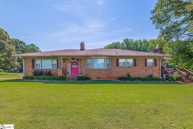 849 Harvey Rd, Greer, SC 29651 - ranch-style home featuring a chimney, a front lawn, and brick siding