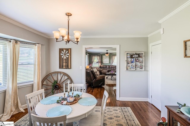 849 Harvey Rd, Greer, SC 29651 - dining space featuring crown molding, wood finished floors, a chandelier, and ceiling fan