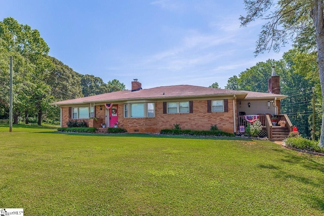 849 Harvey Rd, Greer, SC 29651 - single story home featuring a chimney, a front yard, and brick siding